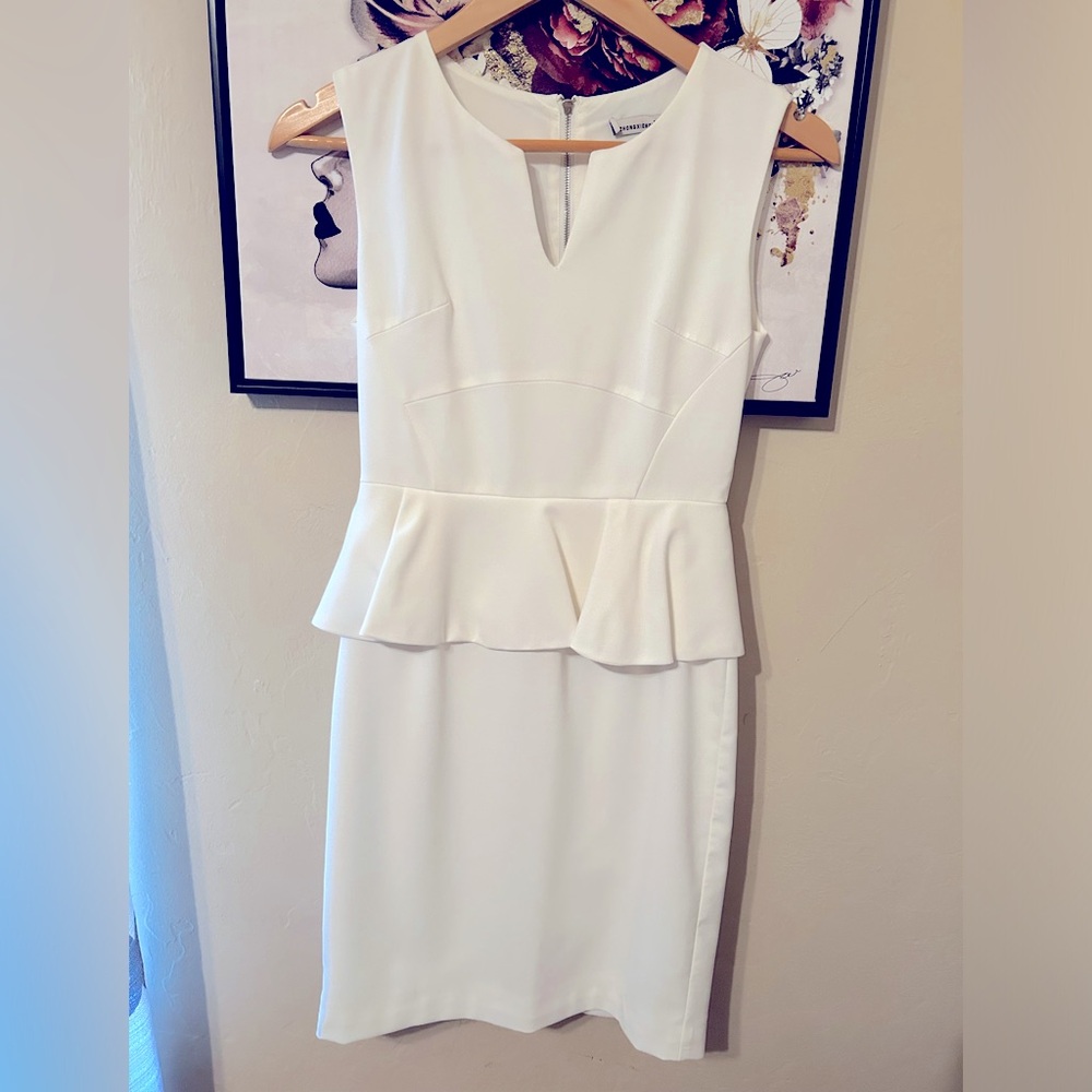 White Sleeveless women’s Peplum Dress Size 4